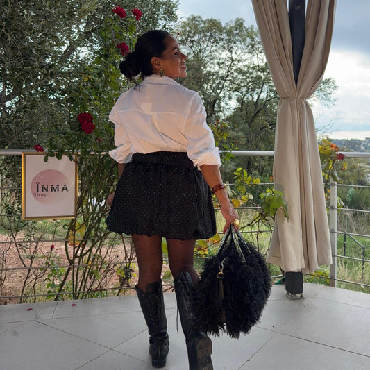Jupe courte noire à pois brillants